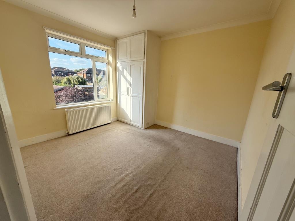 Lot: 59 - THREE-BEDROOM HOUSE FOR REPAIR AND IMPROVEMENT - Bedroom with window to rear aspect